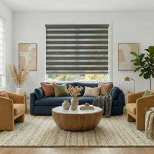 Load image into Gallery viewer, Black Zebra Solar Roller Shades in a living room with a blue sofa, mustard chairs.