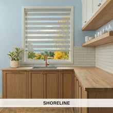 Load image into Gallery viewer, Modern kitchen with wooden cabinets, a sink, with Zebra Solar Roller Shades in light grey called 'Shoreline'.