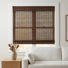 Load image into Gallery viewer, Transform your space with Cordless Woven Wood Shades, effortlessly filtering natural light into a warm and inviting atmosphere, like this serene living room featuring plush furniture.