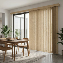 Load image into Gallery viewer, Beige (Evelyn Buckskin) Premier Pvc Vertical Blinds installed in a warm living space, providing durable, easy-to-clean window coverage.