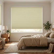 Load image into Gallery viewer, Upgrade your modern bedroom with Beige (Ivory) 1 2 Inch Budget Single Cell Blackout Cordless Shades, blocking out exterior light to create a peaceful atmosphere.