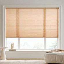 Load image into Gallery viewer, Elegant Beige (Ocher) 7 16 Inch Double Cell Light Filtering Shades complementing a modern living space, allowing bright, diffused daylight to fill the interior.