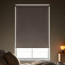 Load image into Gallery viewer, A single Brown Chocolate Signature room darkening shade providing a balance of light control and privacy in a home setting.