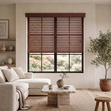 Load image into Gallery viewer, Warm brown wooden cords on our Hardwood Cordless Horizontal Blinds softly filter sunlight in a serene living room setting