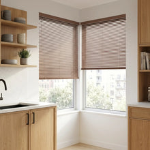 Load image into Gallery viewer, Brown (Nut) Classic Cordless 6g Aluminum Mini Blinds installed in a warm kitchen, perfect for high-traffic areas requiring durable light management.
