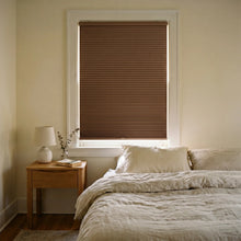 Load image into Gallery viewer, Interior view of a modern bedroom styled with Brown (Warm Cocoa) 9 16 Inch Classic Single Cell Blackout Cordless Shades, offering maximum privacy and light control.