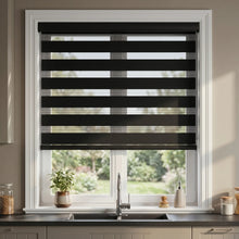 Load image into Gallery viewer, Elegant kitchen with Zebra Room Darkening Roller Shades in charcoal black, perfect for modern spaces and adding subtle drama.