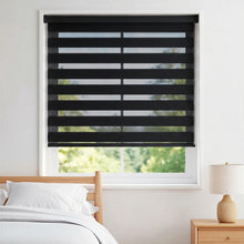 Load image into Gallery viewer, Warm modern bedroom ambiance with Zebra Solar Roller Shades' charcoal-colored solar blinds, filtering natural light and providing UV protection.