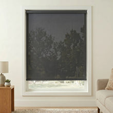 Load image into Gallery viewer, Premier 1% Solar Screen Roller Shade adds a touch of modern sophistication to this cozy living room, providing UV protection while maintaining natural light