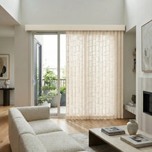 Load image into Gallery viewer, Signature Collection Fabric Vertical Blinds in Cream create a harmonious atmosphere, complementing beige furniture and perfectly diffusing natural light in this inviting living room