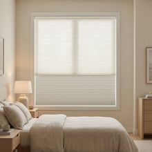 Load image into Gallery viewer, This serene bedroom is enhanced by Creamy White (Blizzard) 5 8 Daynight Single Cell Cellular Cordless Shades, enhancing the window's aesthetic seamlessly.