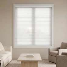 Load image into Gallery viewer, Elegant Creamy White (Cotton) 9 16 Classic Single Cell Light Filtering Cordless Shades complementing a cozy living room, providing excellent UV protection and a soft ambient light.