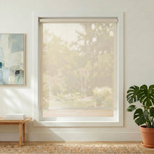 Load image into Gallery viewer, Enhance your home with Premier 10% Solar Screen Roller Shades in creamy white, filtering natural light and protecting furniture from UV damage.