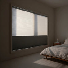 Load image into Gallery viewer, Custom window treatments: Creamy White (Antique Pewter) 9 16 Classic Single Cell Daynight Cordless Shades shown in a modern bedroom, elevating the room's overall look and feel.