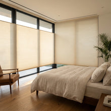 Load image into Gallery viewer, A look at Creamy White 9 16 Classic Single Cell Light Filtering Cordless Top Downbottom Up Cordless Shades inside a modern bedroom, protecting against UV rays while offering top-down versatility.