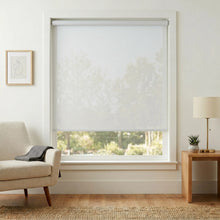 Load image into Gallery viewer, Premier 3% Solar Screen Roller Shade enhances this modern living room's ambiance, filtering UV rays and maintaining natural light while preserving privacy.