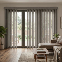 Load image into Gallery viewer, Elegant Signature Collection Fabric Vertical Blinds in Gray harmonize perfectly with this serene outdoor patio, where lush potted plants and wooden decking create a tranquil retreat.