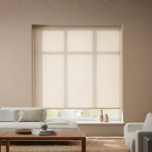 Load image into Gallery viewer, Close-up of the Greyson Tan Flaxen Luxe light filtering fabric, showing its elegant texture and light-diffusing properties.