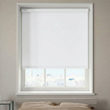 Load image into Gallery viewer, High-performance Matte Vinyl White ProGrade blackout shades ensuring complete privacy and darkness in a home theater room.