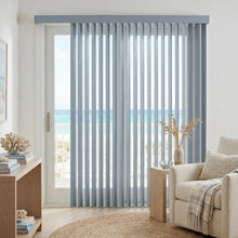 Load image into Gallery viewer, Showcasing Navy (Kathy Blue) Premier Pvc Vertical Blinds in a modern living space, allowing adjustable natural light through durable PVC vanes.