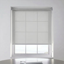 Load image into Gallery viewer, A set of Snow Grey (5 Percent Openness) ProGrade solar shades providing energy efficiency and solar protection on a large window.