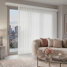 Load image into Gallery viewer, Interior view of a serene living room styled with White (Alyssa White) Premier Pvc Vertical Blinds, offering excellent light control and privacy for large spaces.