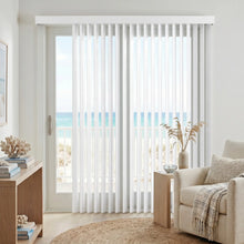 Load image into Gallery viewer, Interior view of a serene living space styled with White (Kathy Bright White) Premier Pvc Vertical Blinds, allowing adjustable natural light through durable PVC vanes.