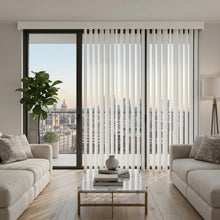 Load image into Gallery viewer, Natural sunlight hits the White (Turnberry Washed White) Signature Pvc Vertical Blinds in this serene living room, ideal for expansive windows requiring versatile light management.
