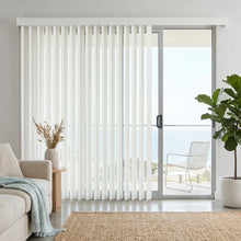 Load image into Gallery viewer, View of a cozy patio with White (Wanderlust Snowdrift) 3 1/2 Inch S Shape Pvc Vertical Blinds, managing sunlight and privacy with smooth s-shaped vanes.