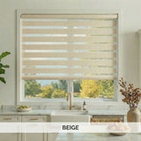 Beige zebra blinds in a kitchen window with a view of trees outside.
