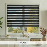 Black striped window blinds in a kitchen with a view of trees outside.