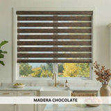 Kitchen window with Madera Chocolate blinds, showing a view of trees outside.