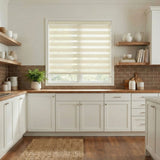 Modern kitchen with white cabinets, wooden countertops, and a window with blinds.