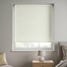 Load image into Gallery viewer, Classic Almost White Signature blackout shades installed in a nursery to create a perfectly dark sleeping environment.
