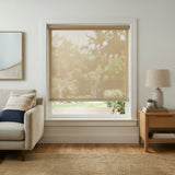 Lifestyle shot of Bamboo Mat solar shades in a beige weave with 7 percent openness, styled in a minimalist living room with a neutral area rug.