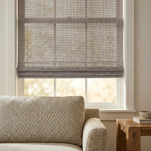Load image into Gallery viewer, Discover the sleek style of Cordless Woven Wood Shades in Beige, effortlessly filtering sunlight for a serene ambiance in this inviting living room
