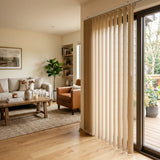 Custom window treatments: Beige Classic Curved Pvc Smooth Vertical Blinds shown in a inviting living room, providing durable, easy-to-clean window coverage.
