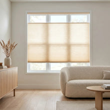 Load image into Gallery viewer, A inviting living space featuring Beige (Fawn) 9 16 Classic Single Cell Light Filtering Cordless Top Downbottom Up Cordless Shades, protecting against UV rays while offering top-down versatility.
