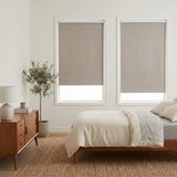 Elegant bedroom ambiance achieved with Classic Fabric Blackout Roller Shades, offering beige softness and comfort