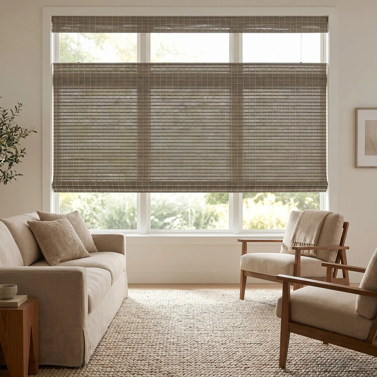 Elegant living space features Woven Wood Cordless Top Down Bottom Up Shades in Beige, effortlessly filtering sunlight and providing adjustable privacy with their versatile lighting capabilities.