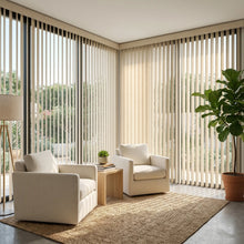Load image into Gallery viewer, A look at Beige (Mammoth Vertical Parchment) Signature Pvc Vertical Blinds inside a inviting living space, offering excellent light control and privacy for large spaces.
