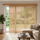 Wood Grain Faux Wood PVC Vertical Blinds expertly filter natural light, complementing beige tones and fostering a warm atmosphere in this inviting open-concept living space.