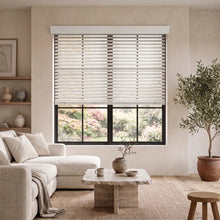 Load image into Gallery viewer, Hardwood Cordless Horizontal Blinds expertly balance natural light with Beige hues in a serene room featuring a wooden coffee table and potted plant.
