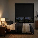 Modern Fabric Blackout Roller Shades in sleek black provide effortless light blocking for a peaceful retreat