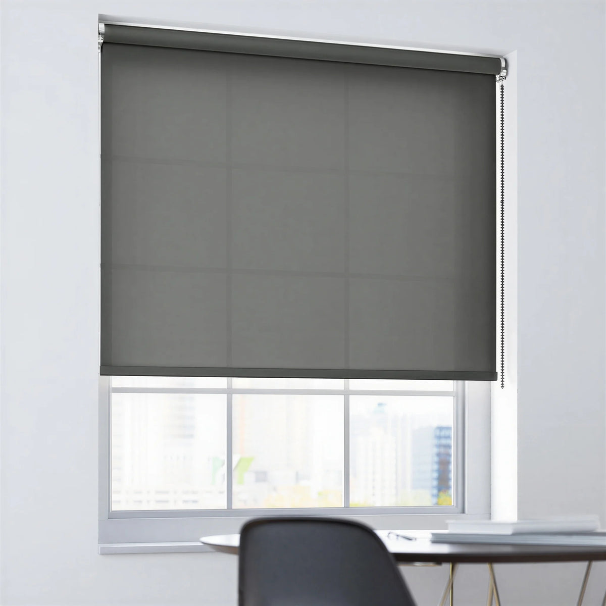 Black ProGrade solar roller shades providing UV protection while maintaining a crisp shaded view of the skyline.