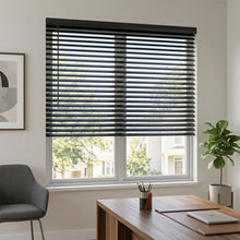Load image into Gallery viewer, Wide view of Black (Black Satin) Classic Cordless 8g Aluminum Mini Blinds complementing a cozy library, offering lightweight yet sturdy window coverage.
