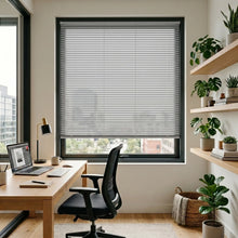 Load image into Gallery viewer, Showcasing Blackish (Dove Grey) Classic Cordless 6g Aluminum Mini Blinds in a cozy living room, offering lightweight yet sturdy window coverage.
