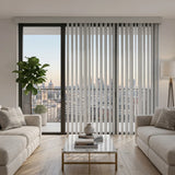 Showcasing Blackwhite (Turnberry Washed Grey) 3 1/2 Inch Signature Pvc Vertical Blinds in a relaxed living space, offering excellent light control and privacy for large spaces.