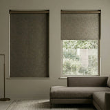 Bronze-brown Jerusalem Bronze Luxe room darkening shades in a stylish living room, offering a textured and organic appearance.