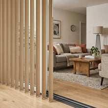 Load image into Gallery viewer, Styling a modern living room with Brown 3 1/2 Inch Classic Curved Pvc Smooth Vertical Blinds, allowing adjustable natural light through durable PVC vanes.
